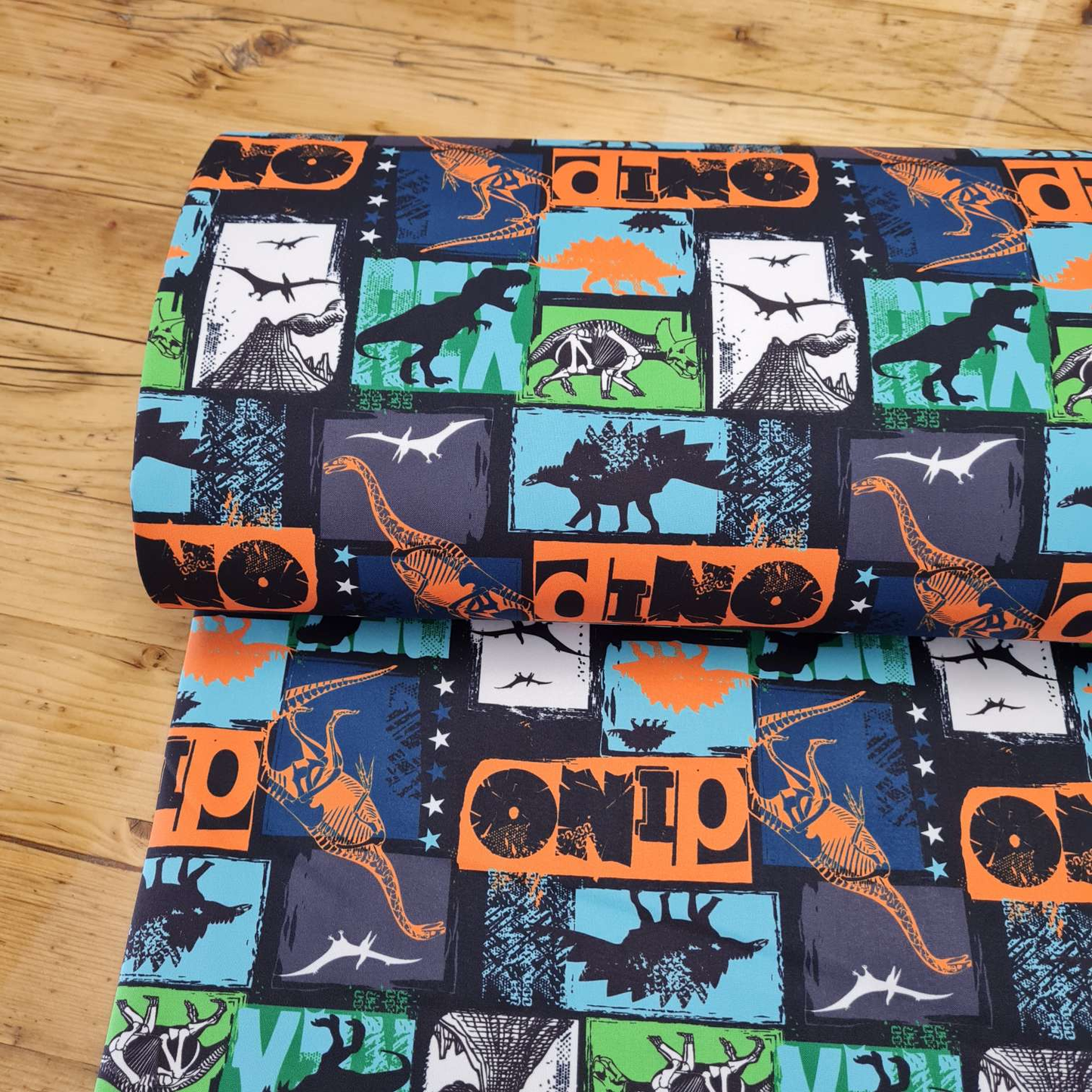 Reststück 1,4 m - Softshell | Dinosaurier | Bunt